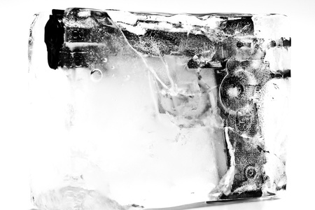 gun control   weapon control   frozen pistolの写真素材