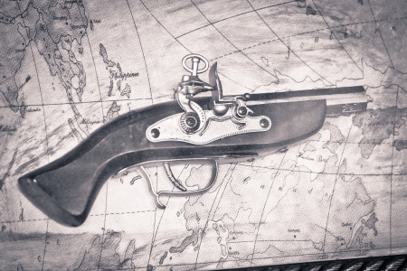 old gun on a map