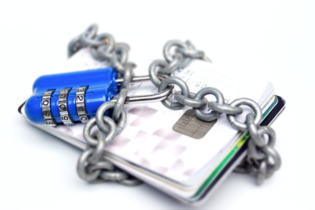 chained credit cards security lock with password - phishing protection concept