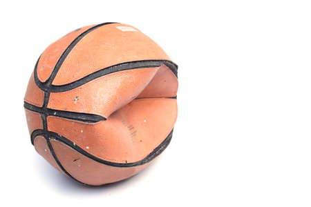 old and leak basketball                        の写真素材