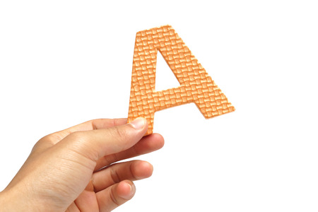 hand picking up A letter  isolated in white 