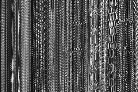 different types and sizes of chain and necklace background