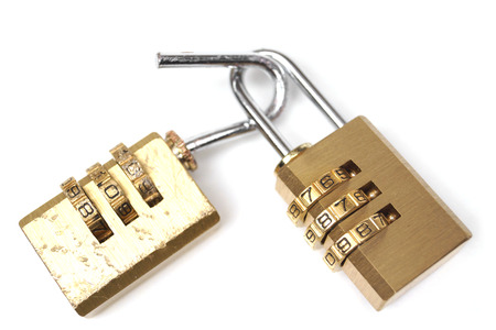 Broken security lock vs. good security lock / Vulnerability and countermeasure concept in computerの写真素材