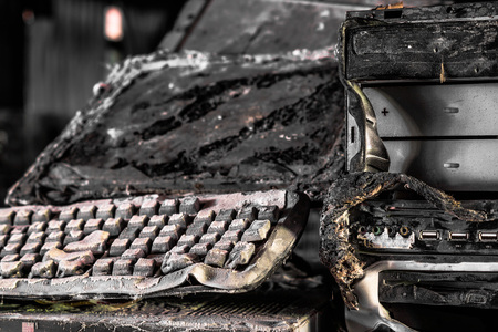 Personal computer burnt due to electricity short circuit - Threat to computer hardware conceptの写真素材