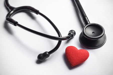 stethoscope with a red heart - healthcare conceptの写真素材