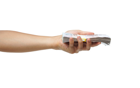 hand holding a pile of banknoteの写真素材