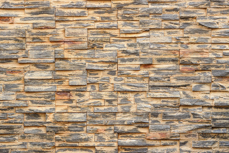 Grunge ledge stone wall backgroundの写真素材