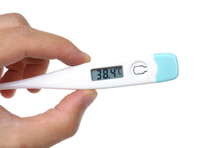 Hand holding a thermometer with a high fever temperature of more than 37 Celsius isolated