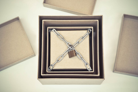 Opening secret boxes with the last one chained and lock / Secret and puzzle conceptの写真素材