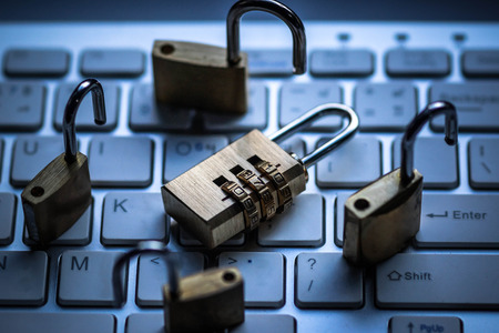 Security lock on computer keyboard - Computer security with data encryption concept