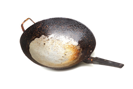 Old pan with burnt stain isolatedの写真素材