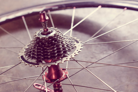 Road bicycle rear wheel with gear cassette in vintage toneの写真素材