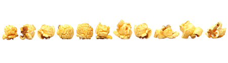 Row of caramel popcorn isolated