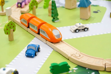 Wooden toy train on the railの写真素材