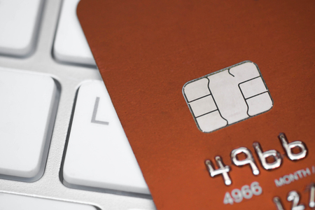 A closeup of credit card chip / Measure to deal with counterfeit card fraud / Credit card security and data encryptionの写真素材