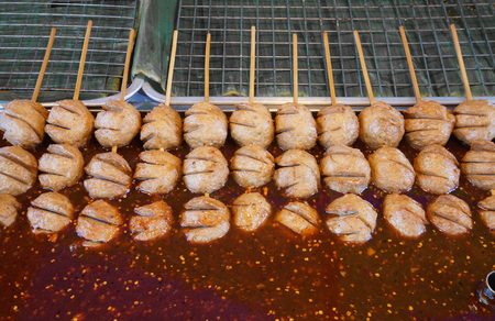 Giant meat balls in spicy sauceの写真素材