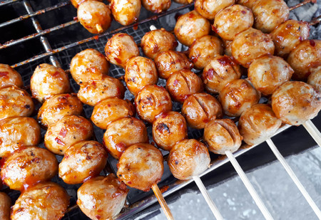 Grilled meat balls in spicy sauceの写真素材