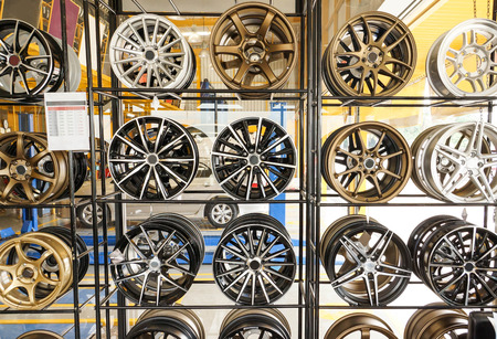 Car alloy wheels on shelf
