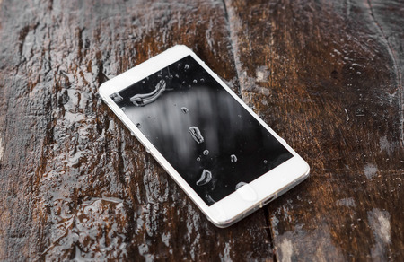 A wet smartphoneの写真素材