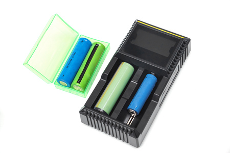 Battery charger with rechargeable batteries in different sizesの写真素材