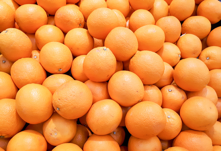 A pile of orangesの写真素材