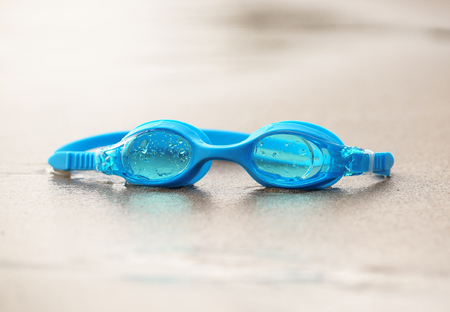 Swimming glasses on the beachの写真素材