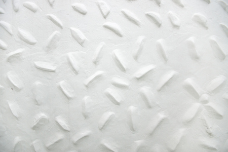 White concrete wall with convex patternの写真素材