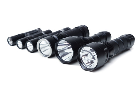 LED torch isolated on white background/ Flashlights for camping in different sizes