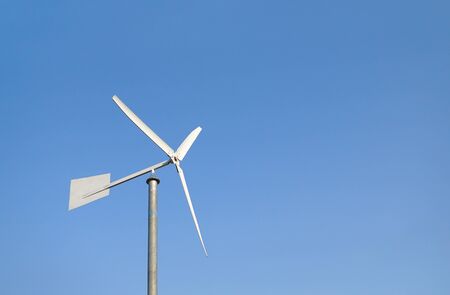 Wind mill with blue sky backgroundの写真素材