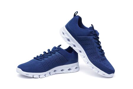 Running shoes in blue and white color isolated on whiteの写真素材