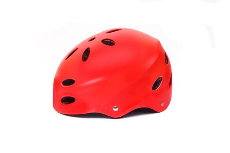A helmet for riding bicycle or playing skate isolated on white backgroundの写真素材