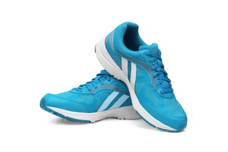 Running shoes in blue color isolated on white                               の写真素材