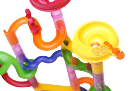 Toy for kids - Marble ball race game isolated on white backgroundの写真素材