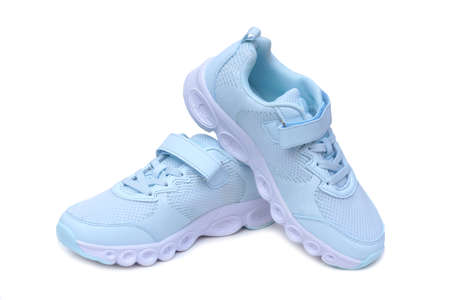 Running shoes in blue color isolated on whiteの写真素材