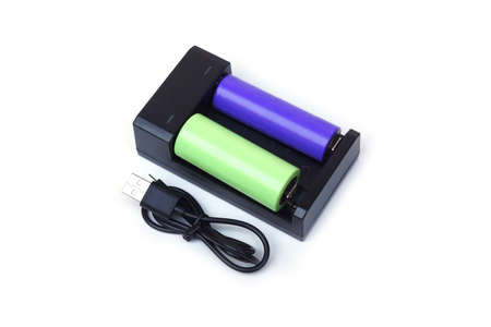 Battery charger with rechargeable batteries in different sizesの写真素材