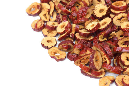 Sliced dried jujube isolated on white backgroundの写真素材