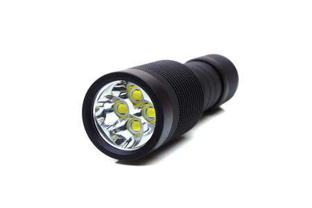A flashlight with four led emitters isolated on white backgroundの写真素材