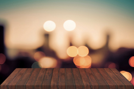 Wood table top isolated on wall