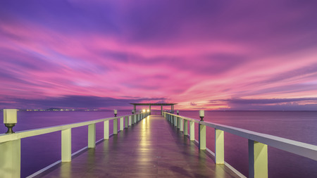 Landscape of Wooded bridge in the port between sunriseの写真素材