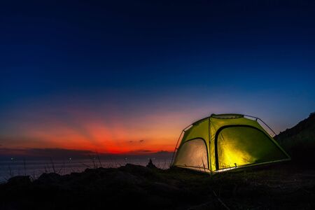 Camping and tent in sunset at north of Thailandの写真素材