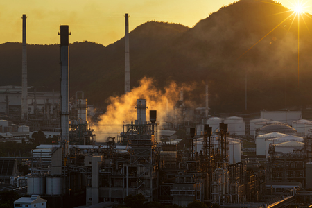 Oil refinery industry at sunset - factory - petrochemical plantのeditorial素材