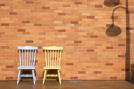 Blue and yellow chairs in the parkの写真素材