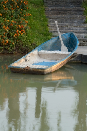 Blue rowing boat on the lake at the parkの写真素材