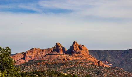 Jagged Peaks On Red Rock Mountains In Late Afternoonの写真素材