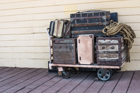 Vintage Luggage Trunks & Cases On Cart At Retro Train Depotの写真素材