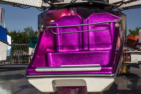 Bright Bucket Seat On Carnival Rideの写真素材