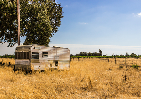 Lone Abandoned Trailer In Open Field