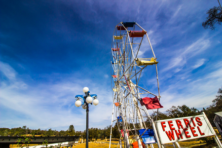 Old Ferris Wheel In Open Fieldの写真素材