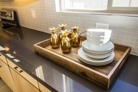 Wooden Serving Tray On Modern Kitchen Counterの写真素材