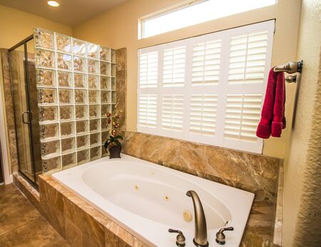 Bathroom With  Tub & Bottle Glass Shower